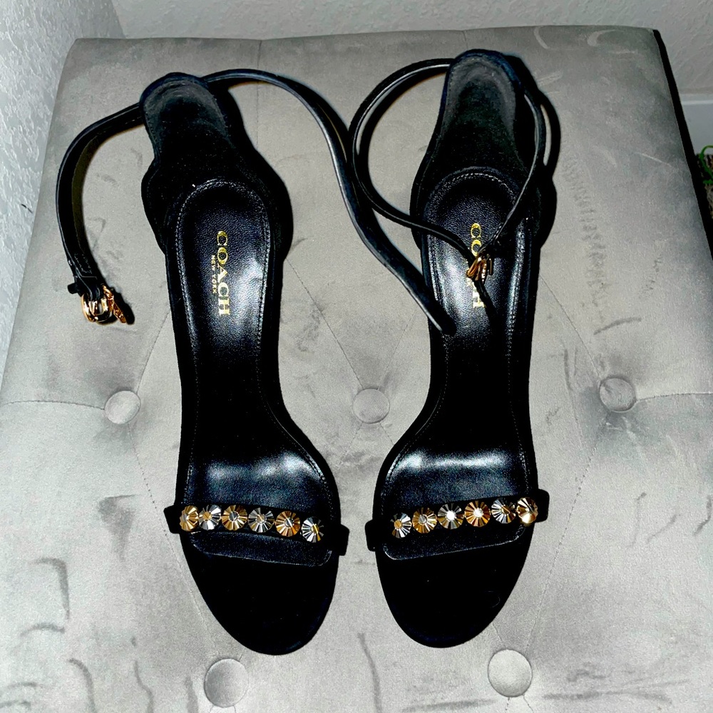Women’s black stiletto COACH heels